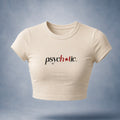 Off-white baby tee crop top with text 'psychotic.' on a blue background